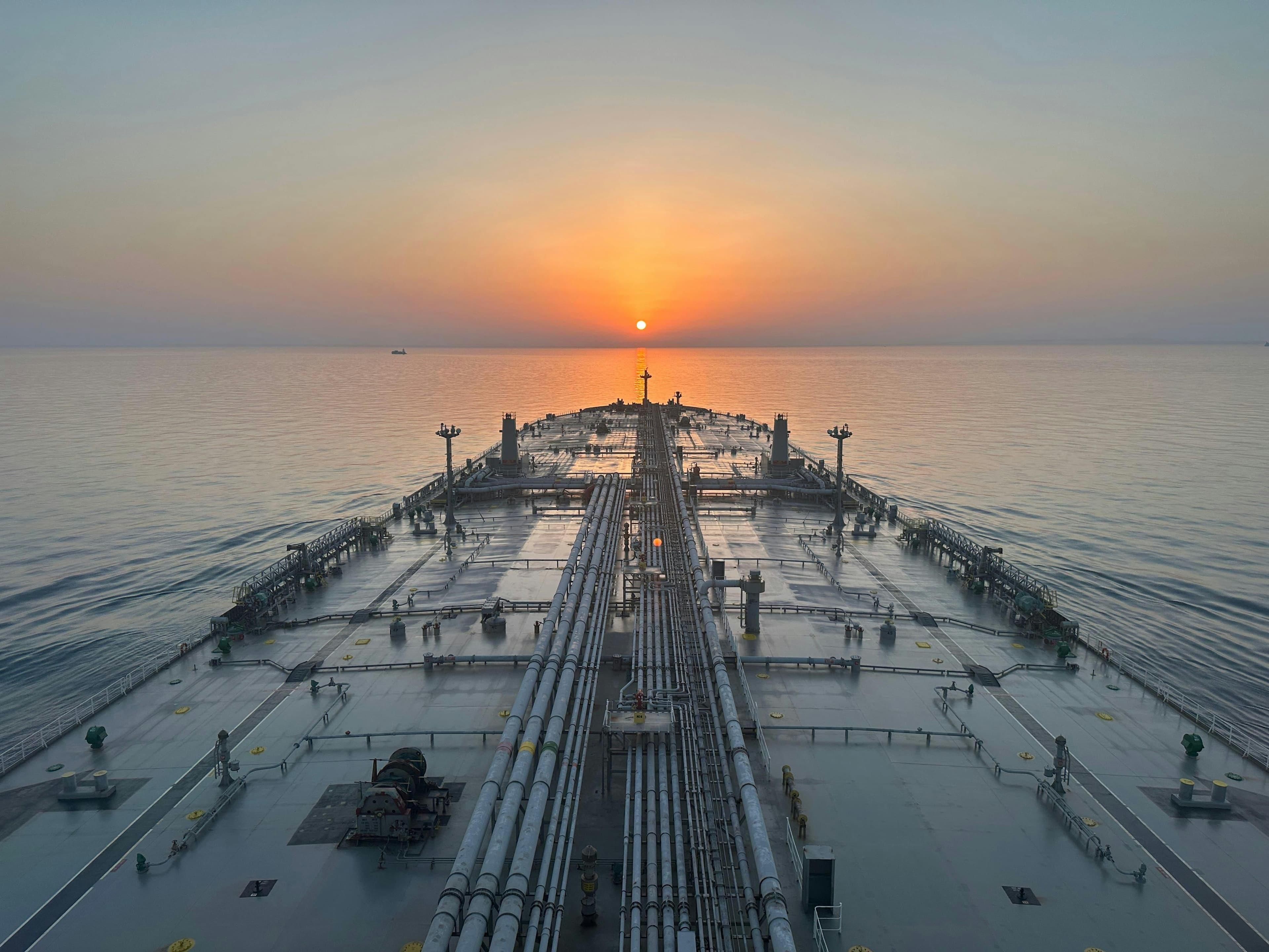 Tanker ship at sunrise recruiting seafarers across global maritime hubs